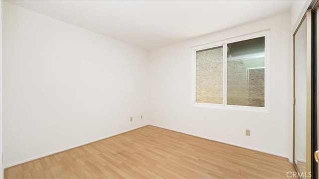 1589 Palomino Ave, Upland, CA 91786 - unfurnished room with light wood-style flooring and baseboards