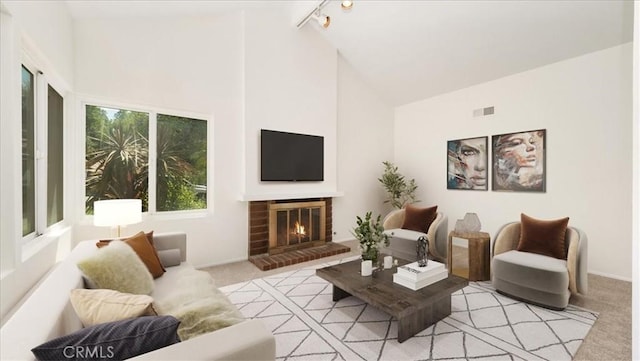 1589 Palomino Ave, Upland, CA 91786 - living area featuring light carpet, high vaulted ceiling, a fireplace, and rail lighting