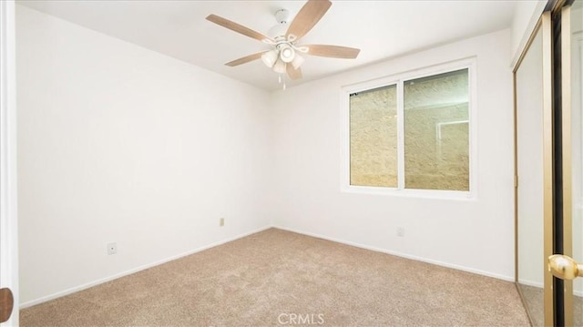 1589 Palomino Ave, Upland, CA 91786 - spare room with light carpet, ceiling fan, and baseboards