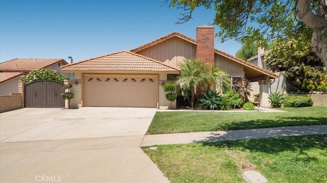 1589 Palomino Ave, Upland, CA 91786 - ranch-style house with a garage, a tiled roof, concrete driveway, a front lawn, and a gate
