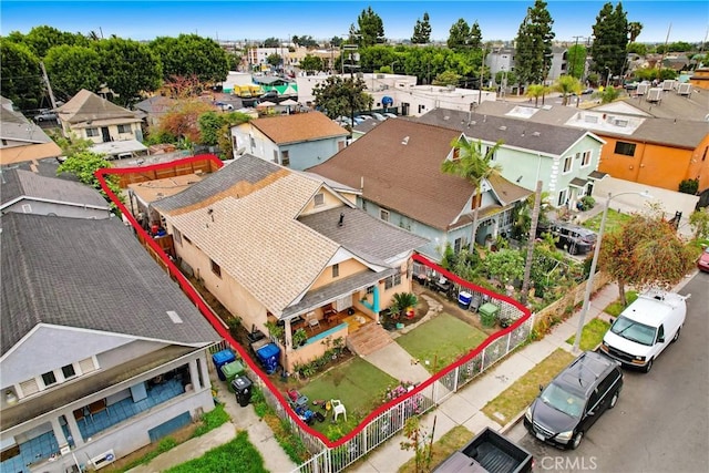 1132 E 53rd St, Los Angeles, CA 90011 - aerial view of residential area featuring property boundaries highlighted