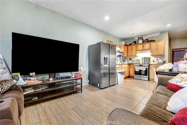 1132 E 53rd St, Los Angeles, CA 90011 - living room with light tile patterned flooring and recessed lighting