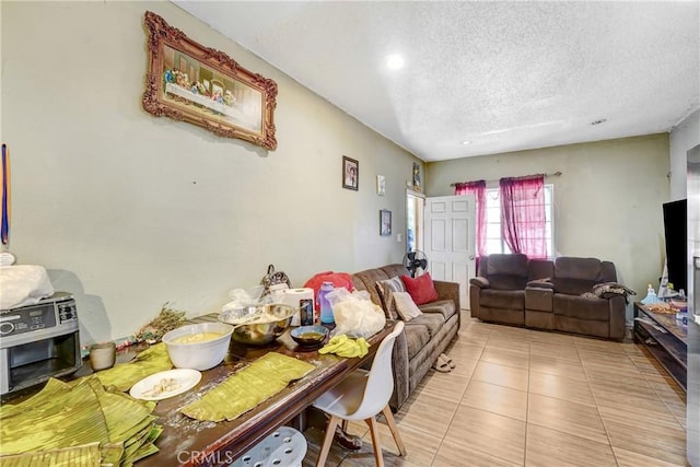 1132 E 53rd St, Los Angeles, CA 90011 - dining space with a textured ceiling, light tile patterned floors, and recessed lighting
