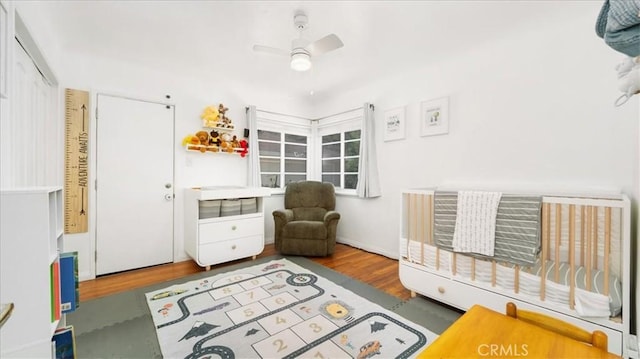 686 W 34th St, San Bernardino, CA 92405 - bedroom featuring wood finished floors and a ceiling fan