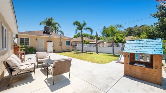 686 W 34th St, San Bernardino, CA 92405 - view of patio featuring central AC unit