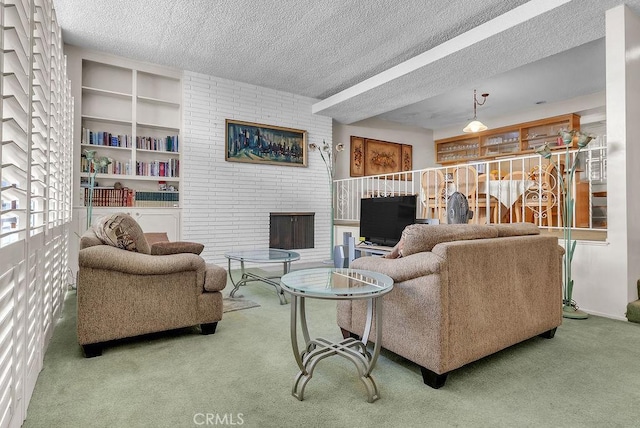 5348 Fairview Blvd Unit 3, Ladera Heights, CA 90056 - living room featuring carpet, a textured ceiling, and a brick fireplace