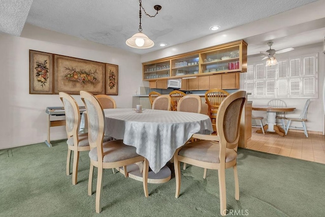 5348 Fairview Blvd Unit 3, Ladera Heights, CA 90056 - dining area featuring carpet, a textured ceiling, recessed lighting, and a ceiling fan
