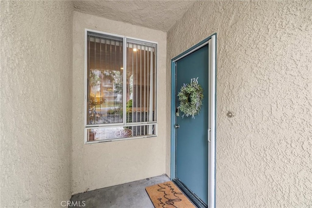 1441 Brett Pl Unit 136, San Pedro, CA 90732 - doorway to property with stucco siding