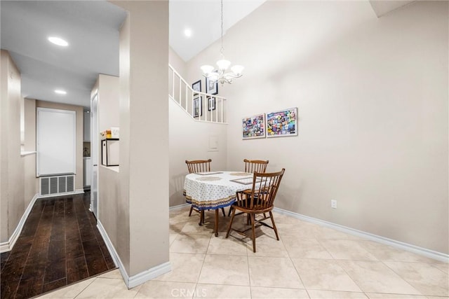 1441 Brett Pl Unit 136, San Pedro, CA 90732 - dining room with baseboards, a chandelier, recessed lighting, high vaulted ceiling, and light tile patterned flooring