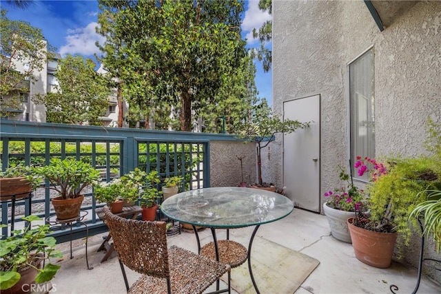 1441 Brett Pl Unit 136, San Pedro, CA 90732 - balcony with outdoor dining space and a patio