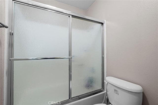 1441 Brett Pl Unit 136, San Pedro, CA 90732 - full bathroom featuring toilet and combined bath / shower with glass door