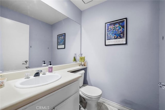 1441 Brett Pl Unit 136, San Pedro, CA 90732 - half bath featuring vanity, toilet, baseboards, and tile patterned floors