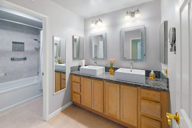 14040 Old Station Rd, San Diego, CA 92064 - full bath with tile patterned flooring, shower / washtub combination, double vanity, and baseboards