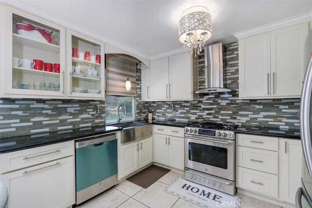 1725 Trinity Loop, Ontario, CA 91764 - kitchen featuring dishwashing machine, wall chimney exhaust hood, stainless steel gas range, and dark countertops