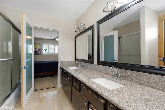 1725 Trinity Loop, Ontario, CA 91764 - full bathroom with double vanity, tile patterned flooring, ceiling fan, ensuite bathroom, and combined bath / shower with glass door