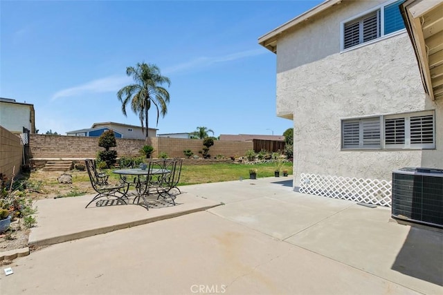 1725 Trinity Loop, Ontario, CA 91764 - fenced backyard with cooling unit, a patio area, and outdoor dining area