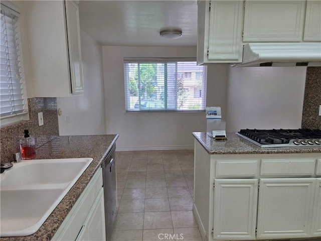 2937 Oakwood Ln, Torrance, CA 90505 - kitchen with range hood, stainless steel gas stovetop, a sink, baseboards, and white cabinets