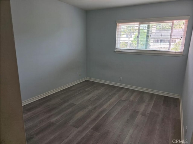 2937 Oakwood Ln, Torrance, CA 90505 - empty room with dark wood-type flooring and baseboards