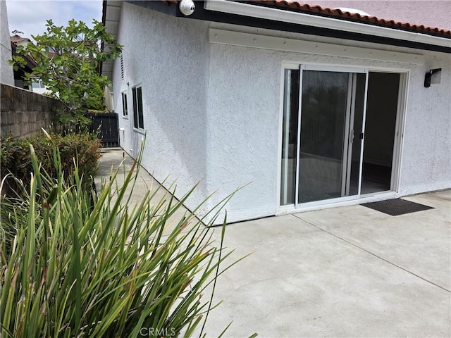2937 Oakwood Ln, Torrance, CA 90505 - back of property featuring stucco siding, a patio, and a tiled roof