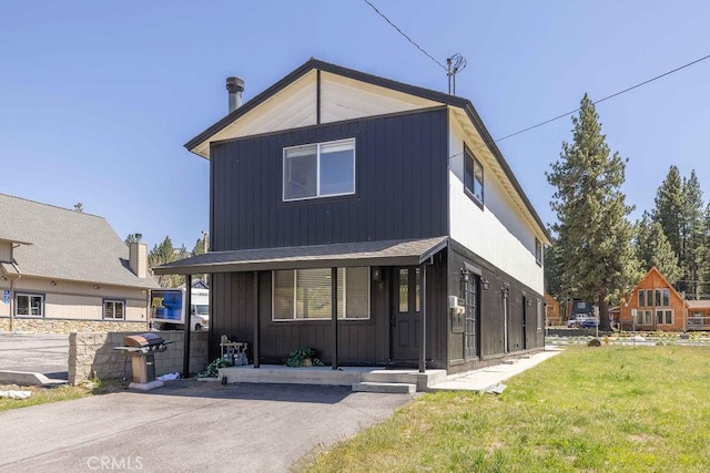 42692 Moonridge Rd, Big Bear Lake, CA 92315 - view of front of home with covered porch and a front yard
