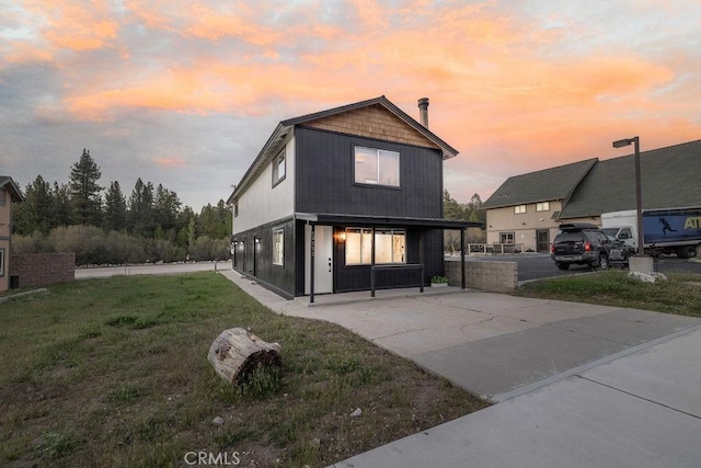 42692 Moonridge Rd, Big Bear Lake, CA 92315 - back of property with a yard, driveway, and a porch