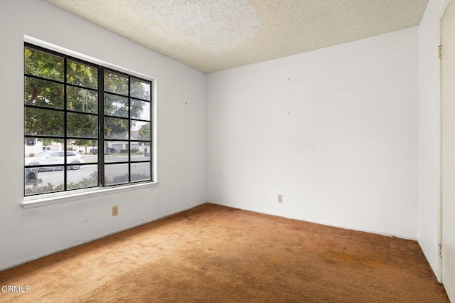201 Village Rd, Port Hueneme, CA 93041 - carpeted empty room featuring a textured ceiling