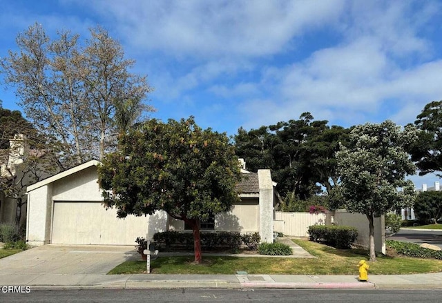 201 Village Rd, Port Hueneme, CA 93041 - obstructed view of property with stucco siding and concrete driveway