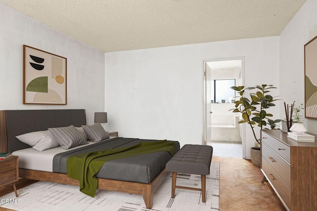 201 Village Rd, Port Hueneme, CA 93041 - carpeted bedroom featuring a textured ceiling and connected bathroom