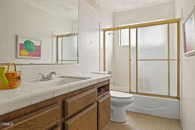 201 Village Rd, Port Hueneme, CA 93041 - bathroom featuring vanity, toilet, and enclosed tub / shower combo