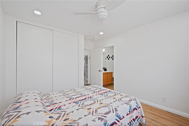 1630 247th Pl, Harbor City, CA 90710 - bedroom featuring a closet, light wood finished floors, baseboards, recessed lighting, and ensuite bath