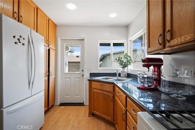 1630 247th Pl, Harbor City, CA 90710 - kitchen featuring freestanding refrigerator, brown cabinetry, a sink, light wood finished floors, and recessed lighting