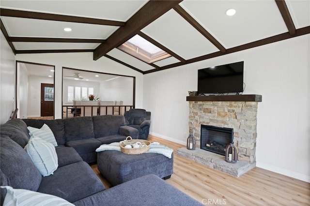 1630 247th Pl, Harbor City, CA 90710 - living room featuring wood finished floors, a skylight, a fireplace, recessed lighting, and baseboards
