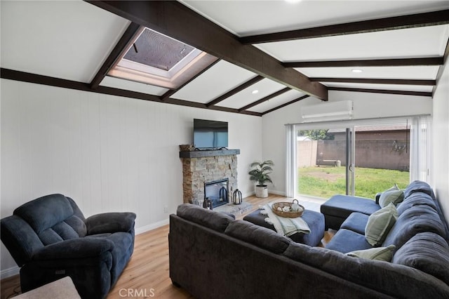 1630 247th Pl, Harbor City, CA 90710 - living area featuring light wood-type flooring, a fireplace, a wall unit AC, baseboards, and recessed lighting