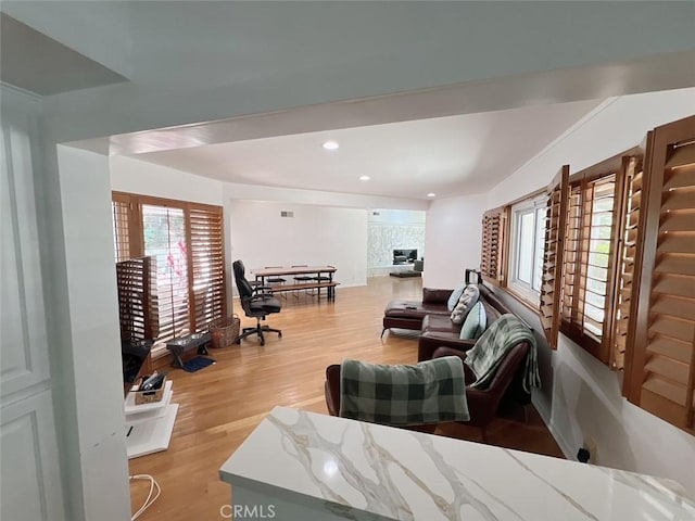 9466 Hidden Valley Pl, Beverly Hills, CA 90210 - living area featuring wood finished floors, plenty of natural light, and recessed lighting