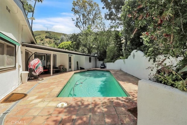 9466 Hidden Valley Pl, Beverly Hills, CA 90210 - view of pool with a patio and a fenced backyard