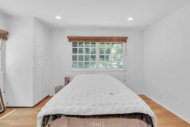 9466 Hidden Valley Pl, Beverly Hills, CA 90210 - bedroom with light wood finished floors and recessed lighting