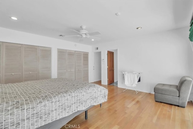 9466 Hidden Valley Pl, Beverly Hills, CA 90210 - bedroom with multiple closets, light wood finished floors, ceiling fan, and recessed lighting