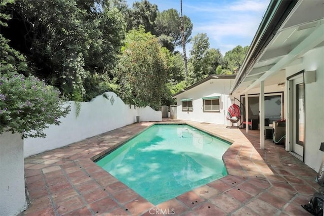9466 Hidden Valley Pl, Beverly Hills, CA 90210 - view of swimming pool with a patio area and a fenced backyard