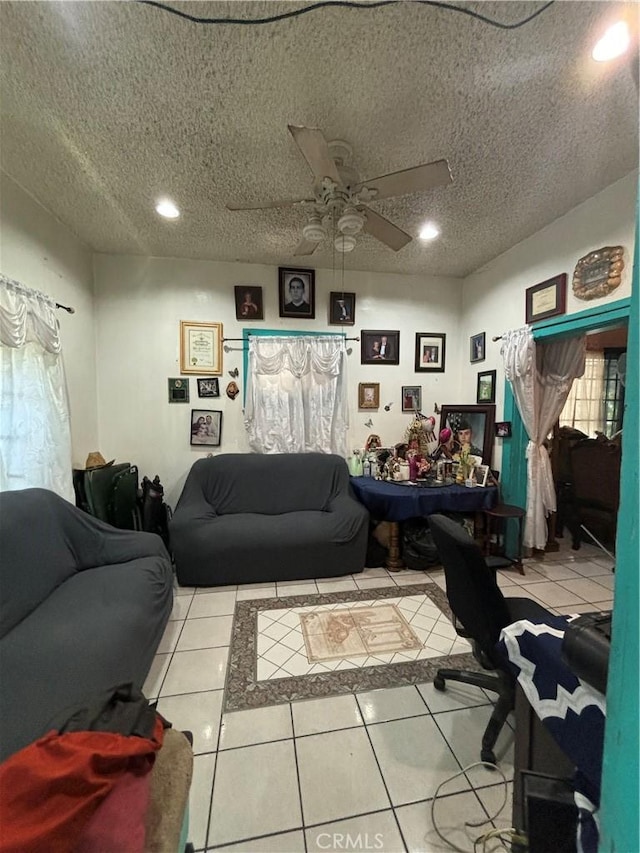 223 E 28th St, Los Angeles, CA 90011 - living area featuring light tile patterned floors, ceiling fan, a textured ceiling, and recessed lighting