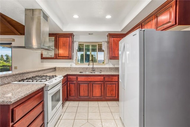 4256 Mockingbird Ln, Banning, CA 92220 - kitchen featuring white appliances, island exhaust hood, plenty of natural light, dark brown cabinets, and recessed lighting