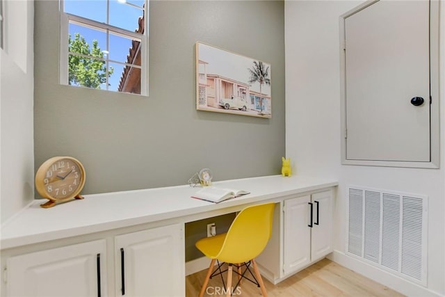 28210 Canterbury Ct, Valencia, CA 91354 - office with built in desk and light wood finished floors