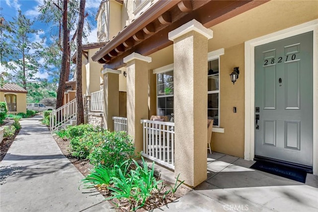 28210 Canterbury Ct, Valencia, CA 91354 - entrance to property featuring stucco siding