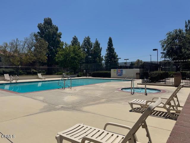 1742 Sinaloa Rd Unit 329, Simi Valley, CA 93065 - community pool with a patio area and a hot tub