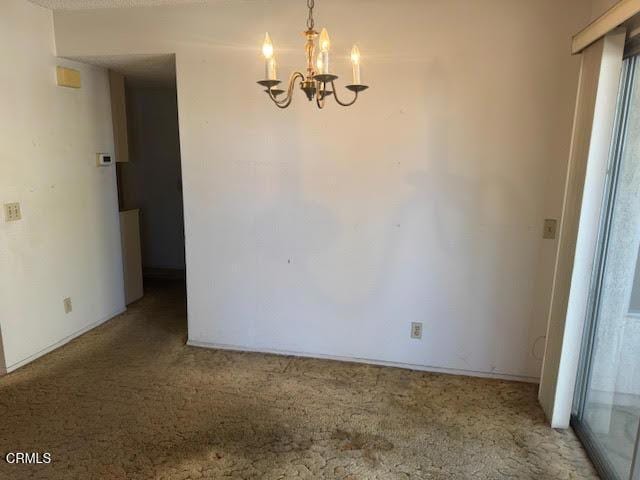 1742 Sinaloa Rd Unit 329, Simi Valley, CA 93065 - unfurnished room featuring light colored carpet and a chandelier