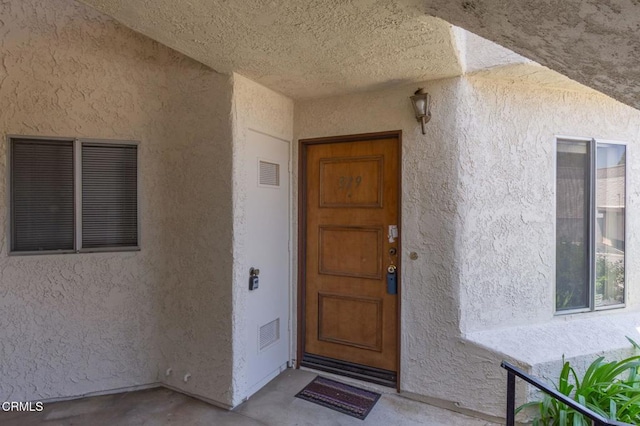1742 Sinaloa Rd Unit 329, Simi Valley, CA 93065 - view of exterior entry with stucco siding