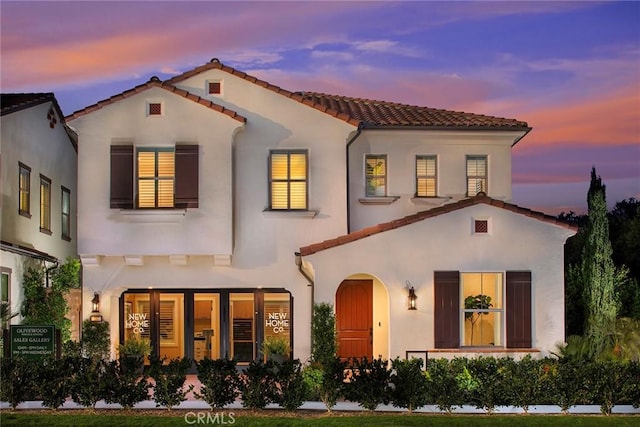 114 Oakstone, Irvine, CA 92618 - mediterranean / spanish-style home featuring stucco siding and a tile roof