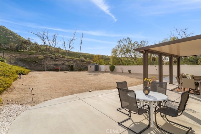 20793 Spring Mountain Rd, Riverside, CA 92507 - fenced backyard with outdoor dining area and a patio area