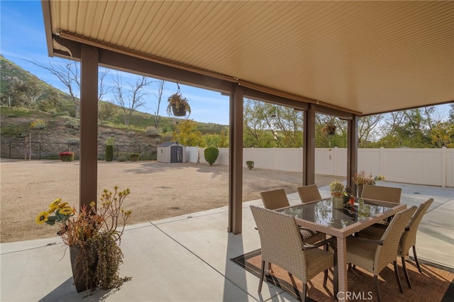 20793 Spring Mountain Rd, Riverside, CA 92507 - fenced backyard featuring a patio and outdoor dining space