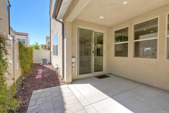 678 Gemstone Dr, San Marcos, CA 92078 - fenced backyard with a patio and central AC unit
