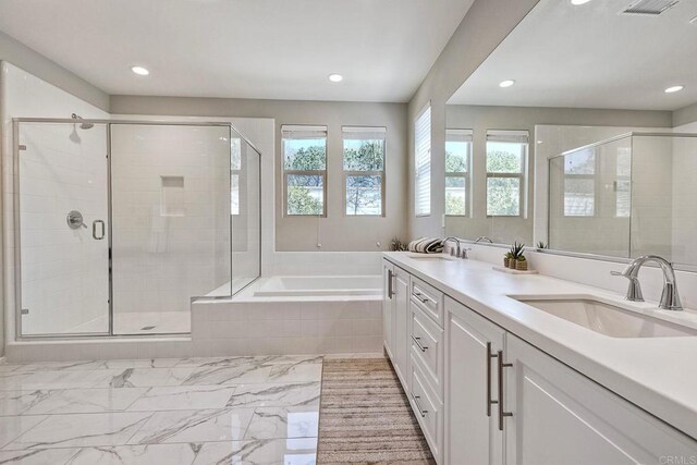 678 Gemstone Dr, San Marcos, CA 92078 - bathroom featuring a bath, double vanity, a stall shower, recessed lighting, and marble finish flooring